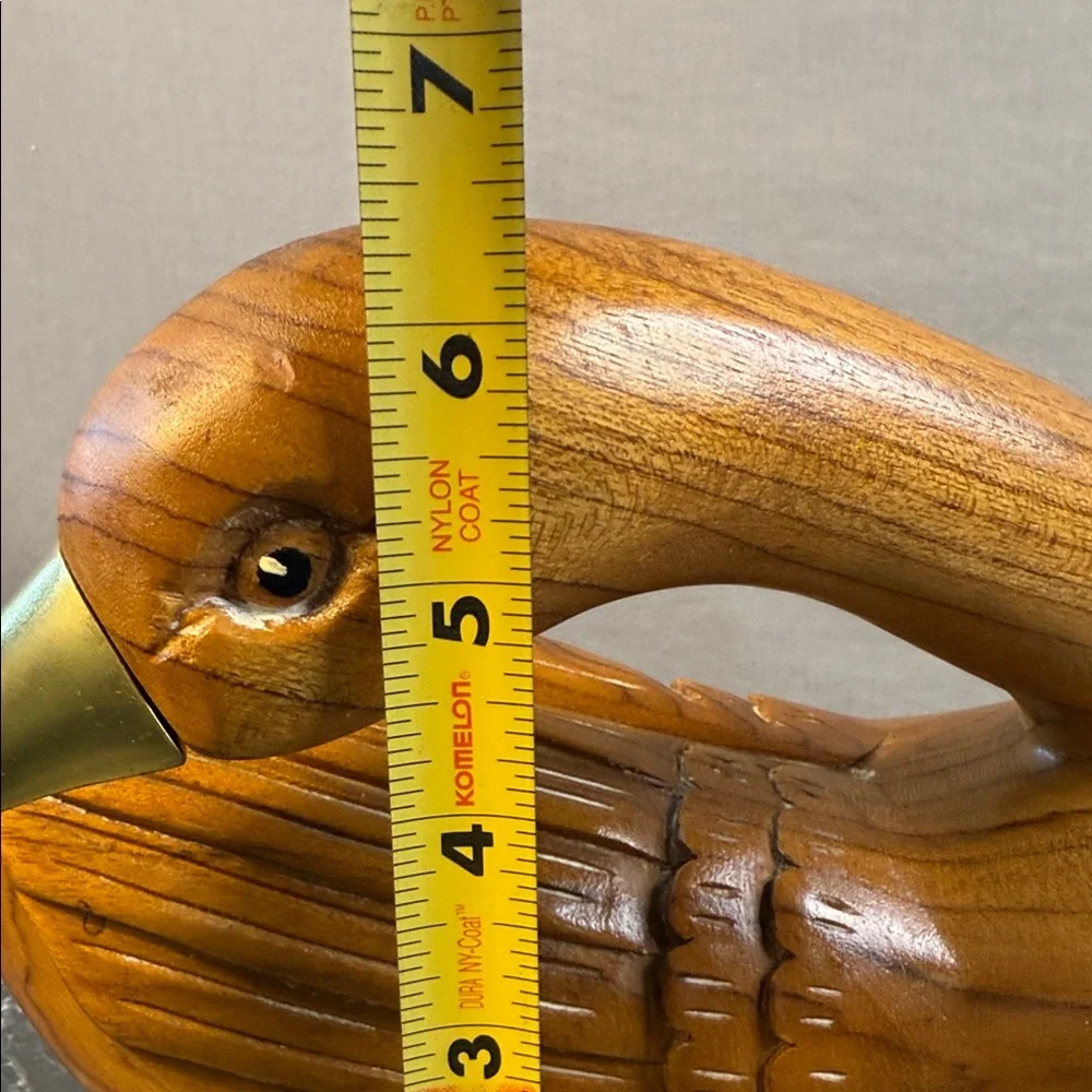 Handcrafted vintage Wooden goose decoy with brass beak
